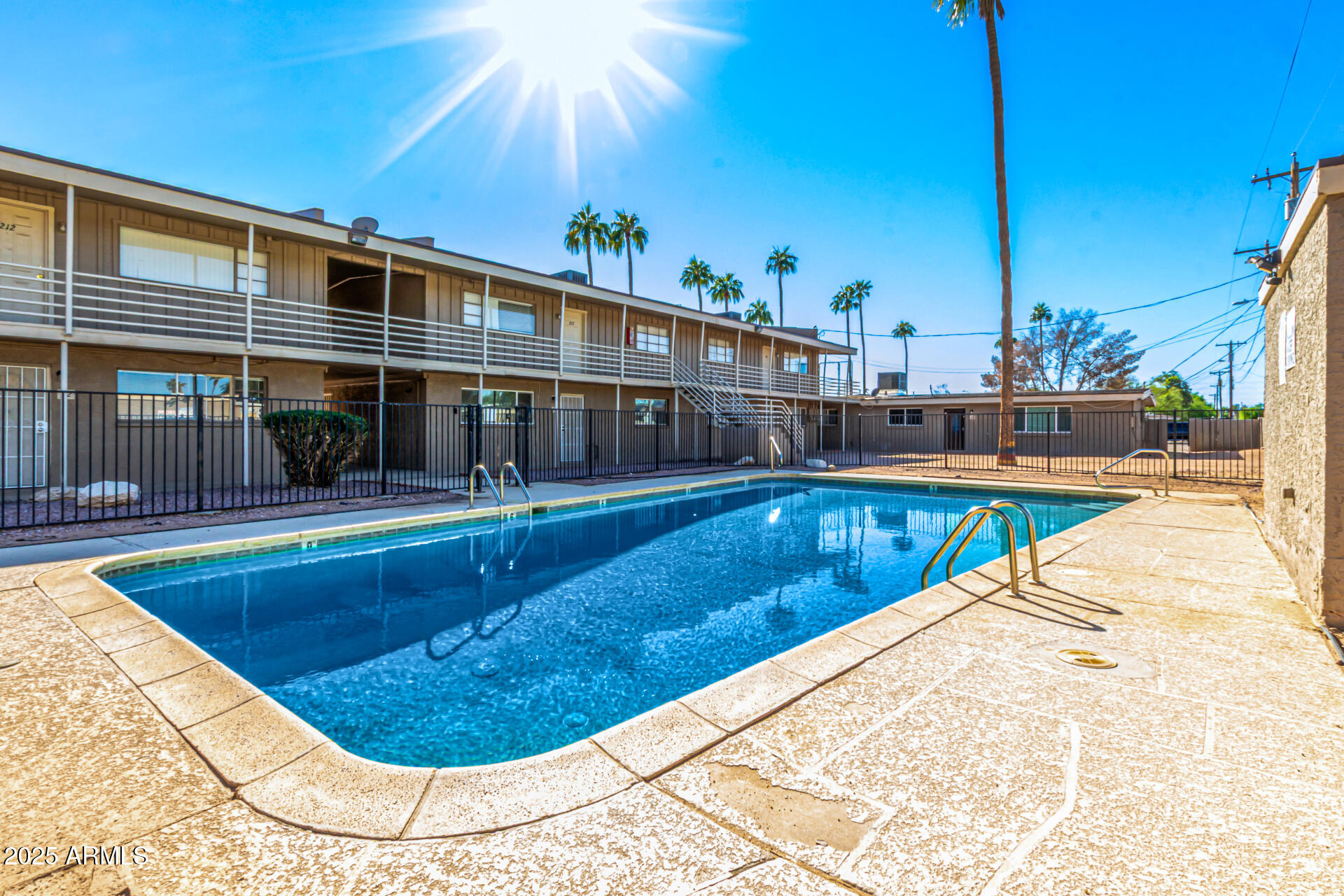 2150 West Missouri Avenue, Unit 108 Phoenix, AZ 85015 - Photo 27 of 28 a view of swimming pool with seating area