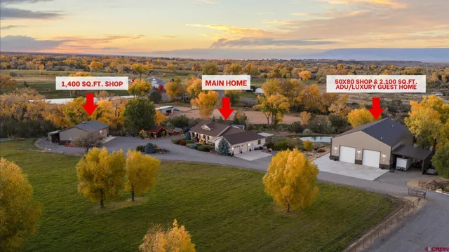 a view of a swimming pool with an outdoor seating