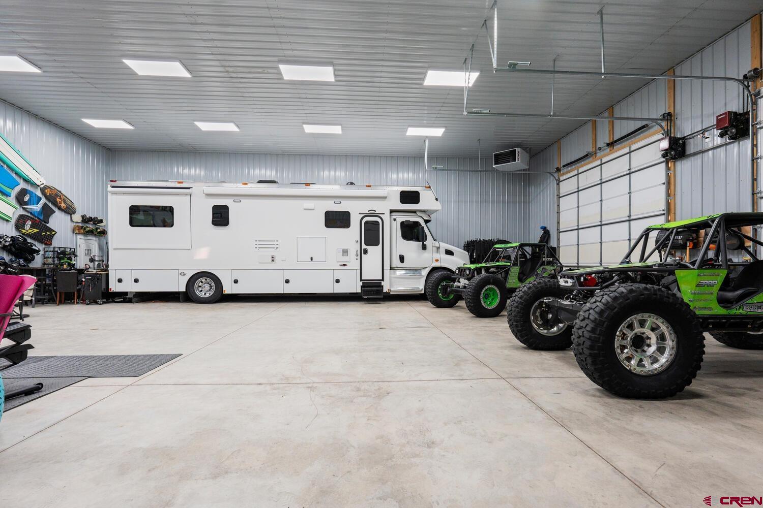 60075-60085 Oak Grove Road Montrose, CO 81403 - Photo 25 of 44 a view of a garage with storage