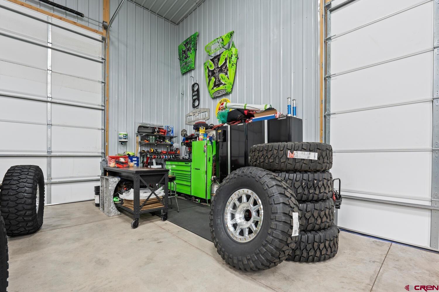 60075-60085 Oak Grove Road Montrose, CO 81403 - Photo 26 of 44 a utility room with toys and furniture