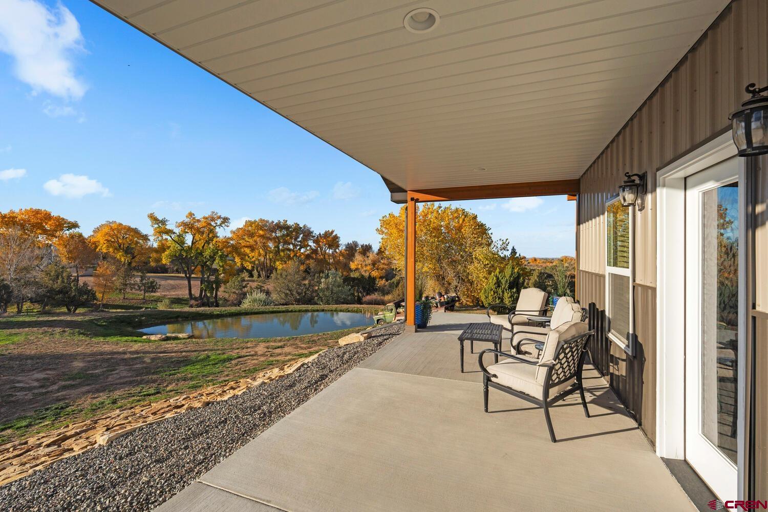 60075-60085 Oak Grove Road Montrose, CO 81403 - Photo 38 of 44 a view of swimming pool with outdoor seating and yard