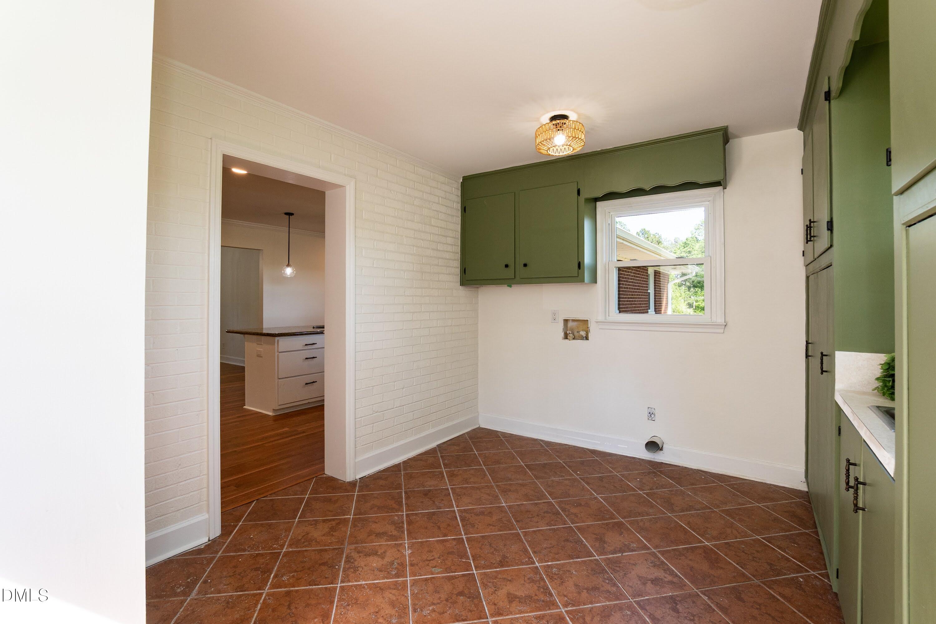 641 Rocky Ford Road Louisburg, NC 27549 - Photo 23 of 38 a view of a closet and utility room