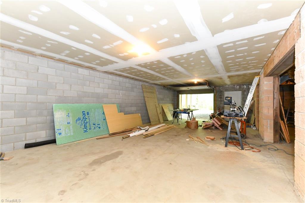 8202 Dennis Road Walnut Cove, NC 27052 - Photo 30 of 35 Basement Tandem Garage/Workshop