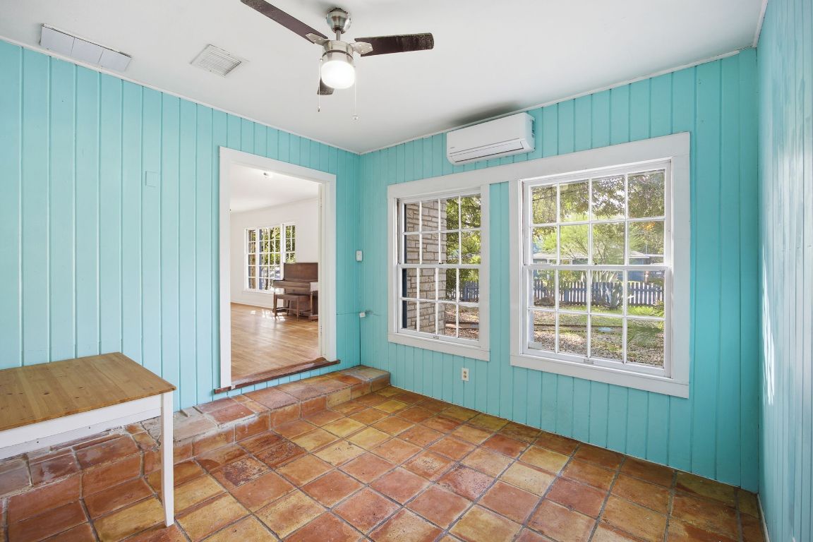 1706 East 38th 1/2 Street Austin, TX 78722 - Photo 7 of 24 a view of an empty room with a window