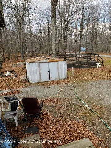 a view of a wooden fence