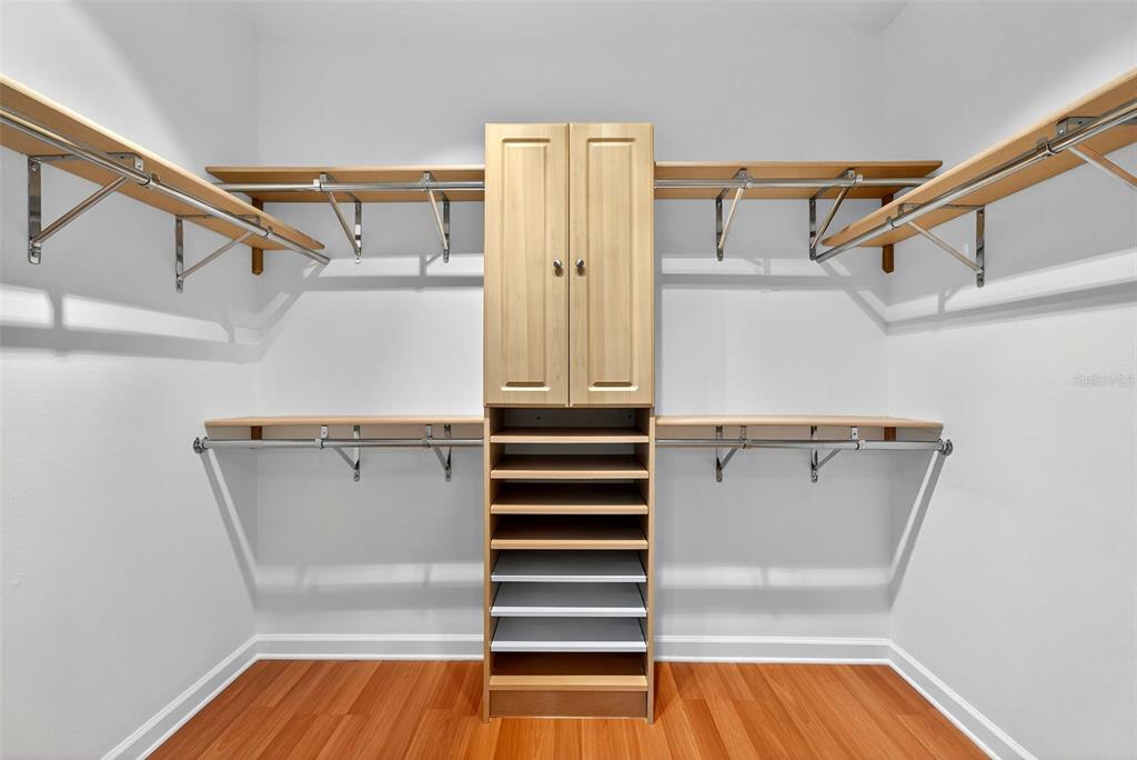 3488 Mistletoe Lane Longboat Key, FL 34228 - Photo 40 of 82 a view of walk in closet with empty racks