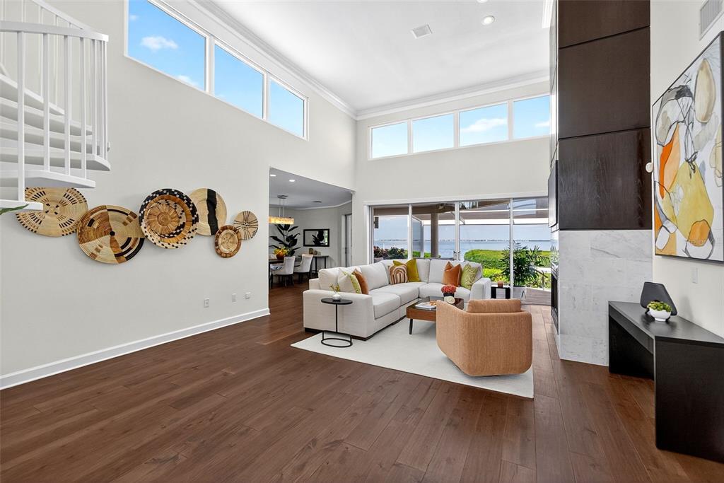 3488 Mistletoe Lane Longboat Key, FL 34228 - Photo 4 of 82 a living room with furniture and a wall painting