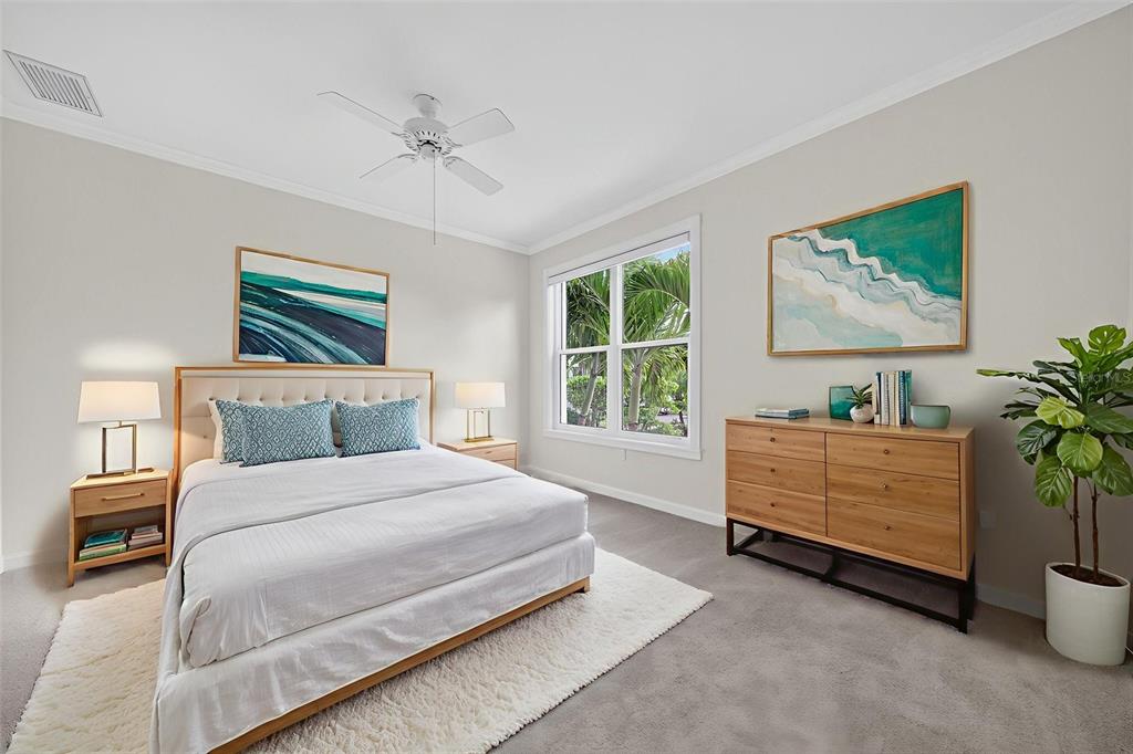 3488 Mistletoe Lane Longboat Key, FL 34228 - Photo 44 of 82 a bedroom with a bed and a window