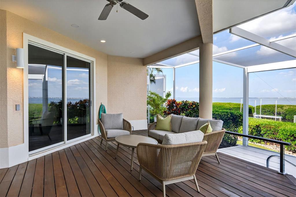 3488 Mistletoe Lane Longboat Key, FL 34228 - Photo 53 of 82 a living room with furniture and garden view