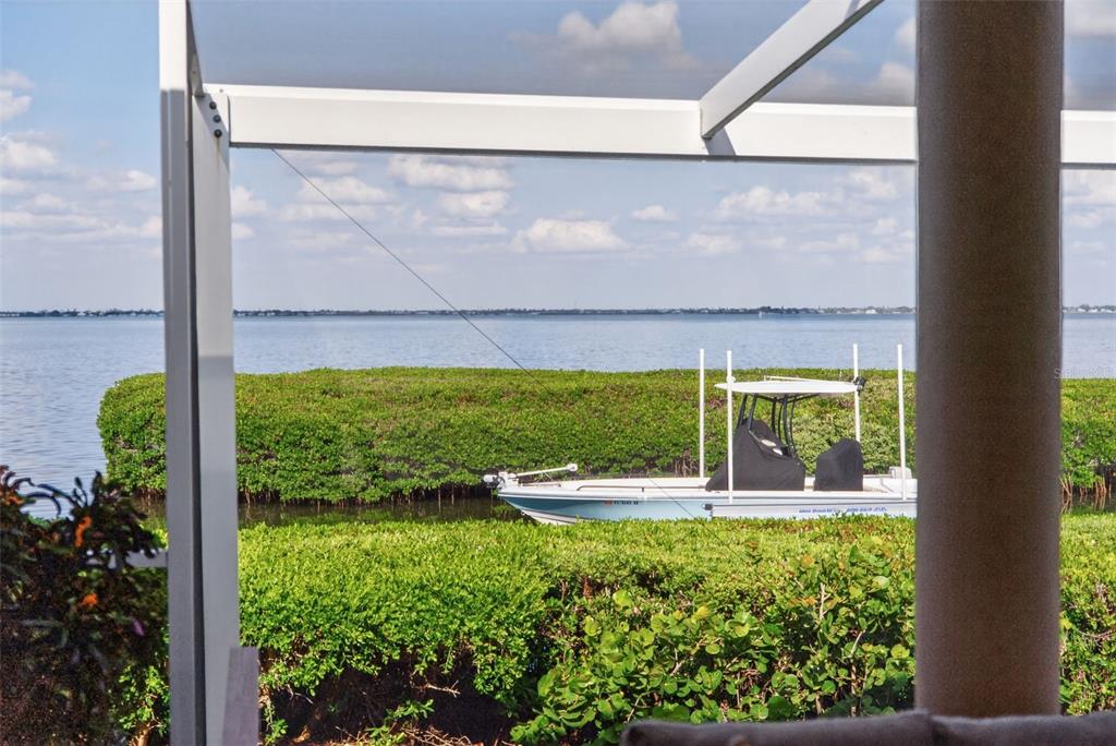 3488 Mistletoe Lane Longboat Key, FL 34228 - Photo 55 of 82 a view of a back yard from a window