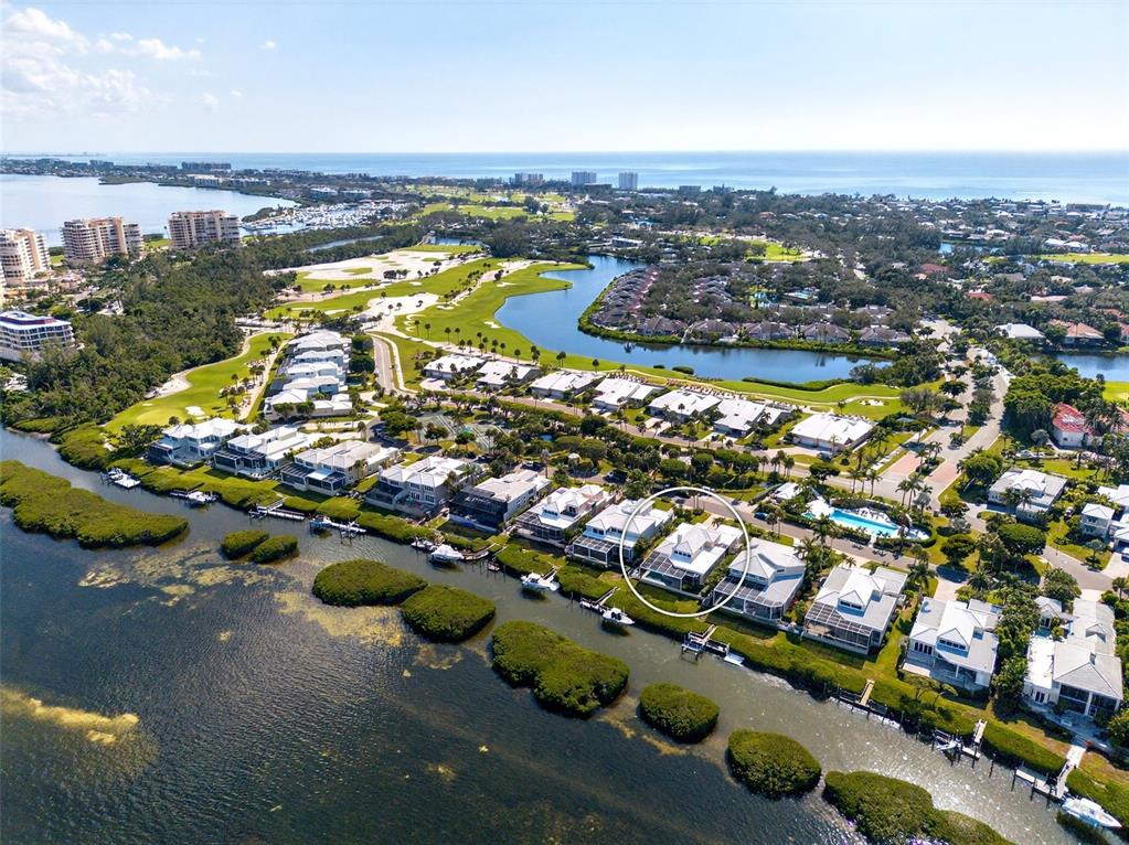 3488 Mistletoe Lane Longboat Key, FL 34228 - Photo 64 of 82 an aerial view of residential houses with outdoor space