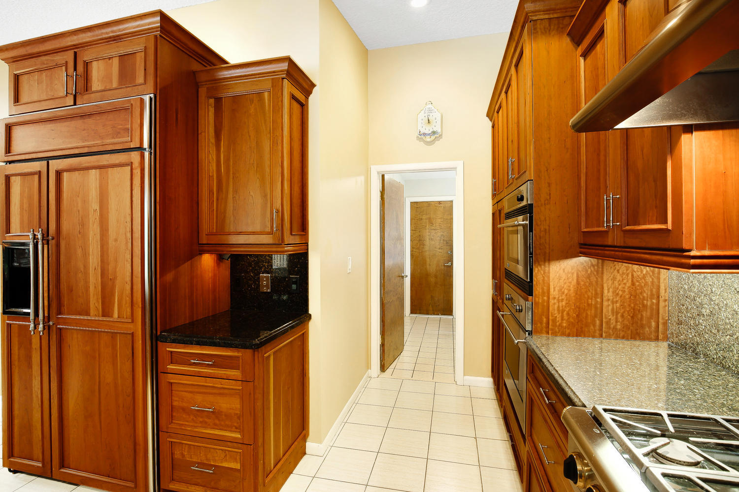 2412 Northwest 35th Street Boca Raton, FL 33431 - Photo 5 of 34 Kitchen to Laundry Room and Garage