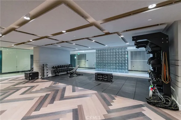 a view of a patio with a table and chairs in a patio