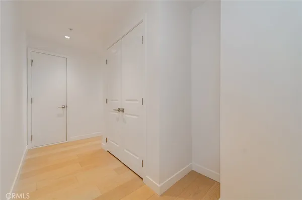 a kitchen with stainless steel appliances a refrigerator stove and microwave