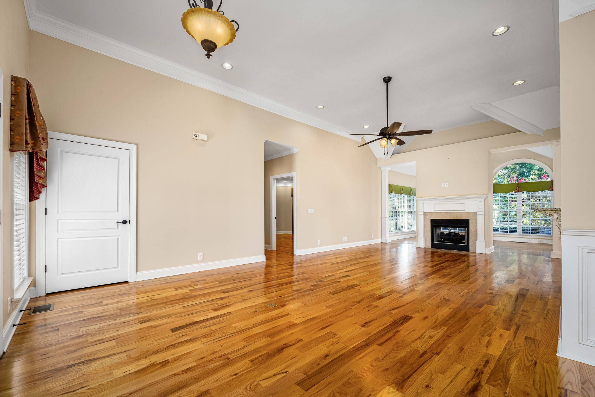 2101 Stratford Road Murfreesboro, TN 37129 - Photo 14 of 54 a view of a livingroom with a fireplace a fireplace and wooden floor