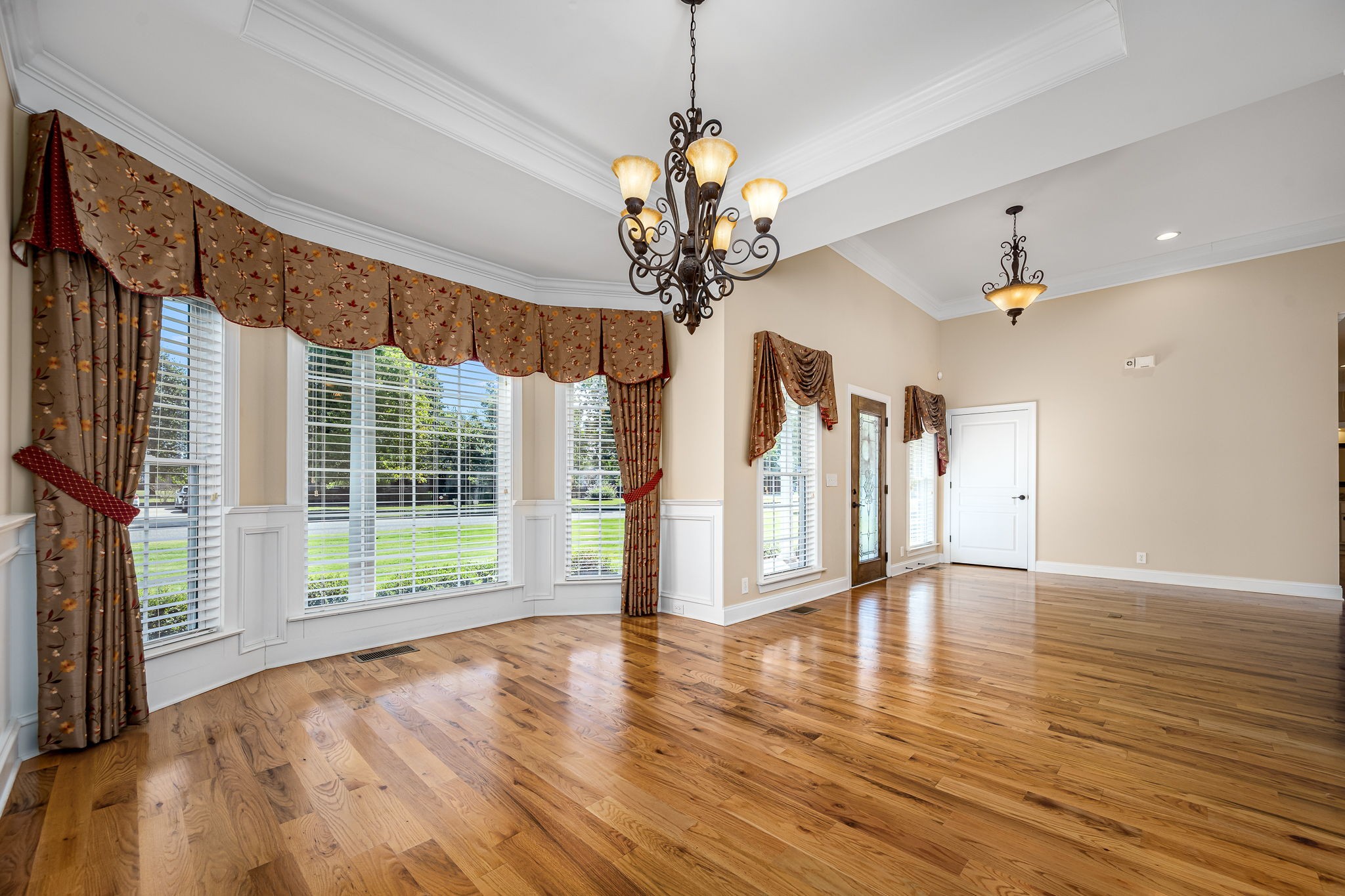 2101 Stratford Road Murfreesboro, TN 37129 - Photo 18 of 54 a view of an empty room with wooden floor and a window