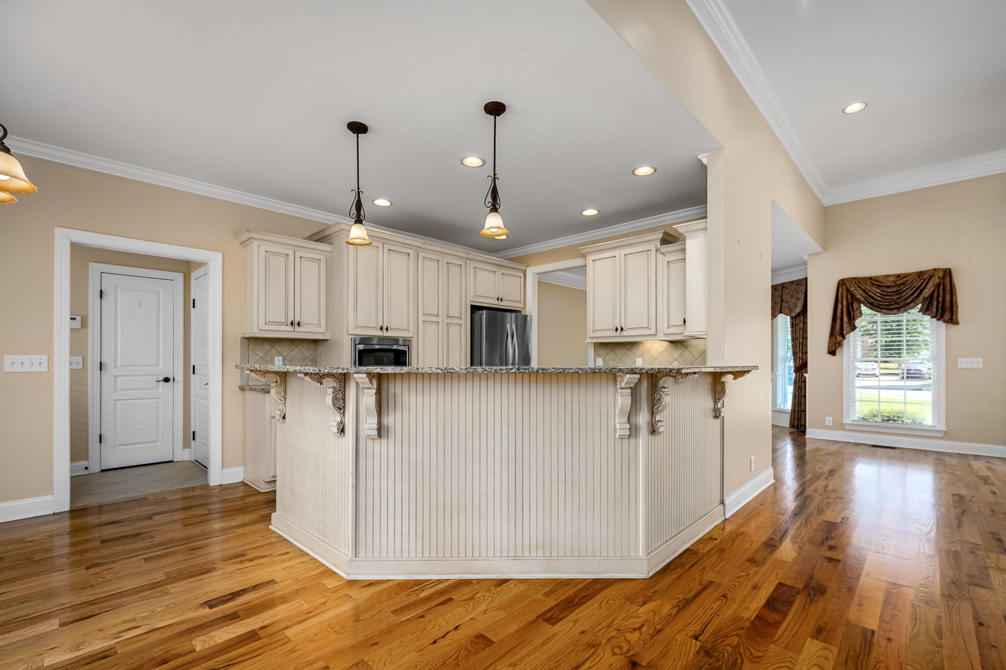 2101 Stratford Road Murfreesboro, TN 37129 - Photo 21 of 54 a open kitchen with white cabinets and stainless steel appliances