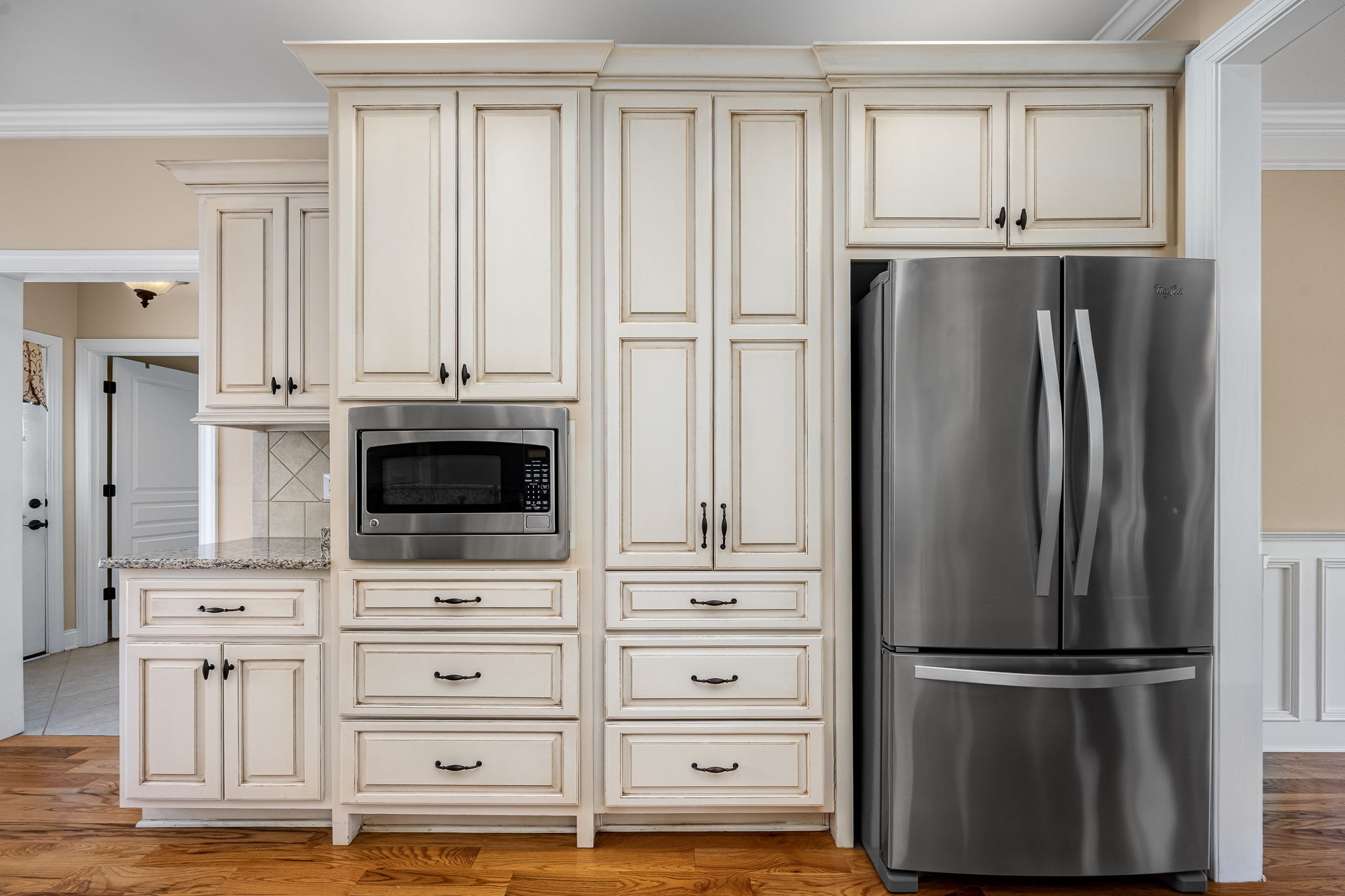 2101 Stratford Road Murfreesboro, TN 37129 - Photo 22 of 54 a kitchen with stainless steel appliances wooden floor and cabinet