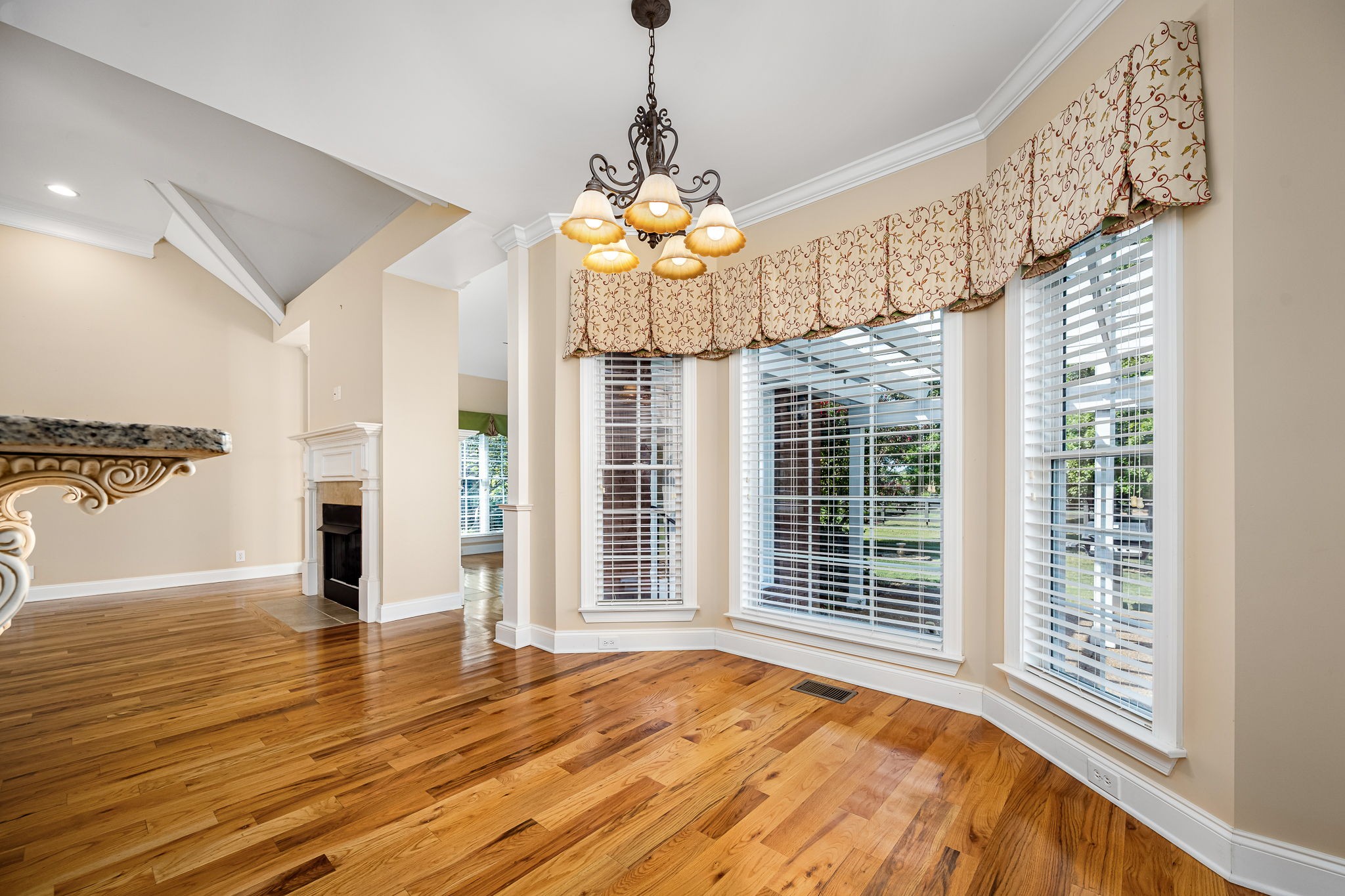 2101 Stratford Road Murfreesboro, TN 37129 - Photo 23 of 54 a bedroom with wooden floor fireplace and windows