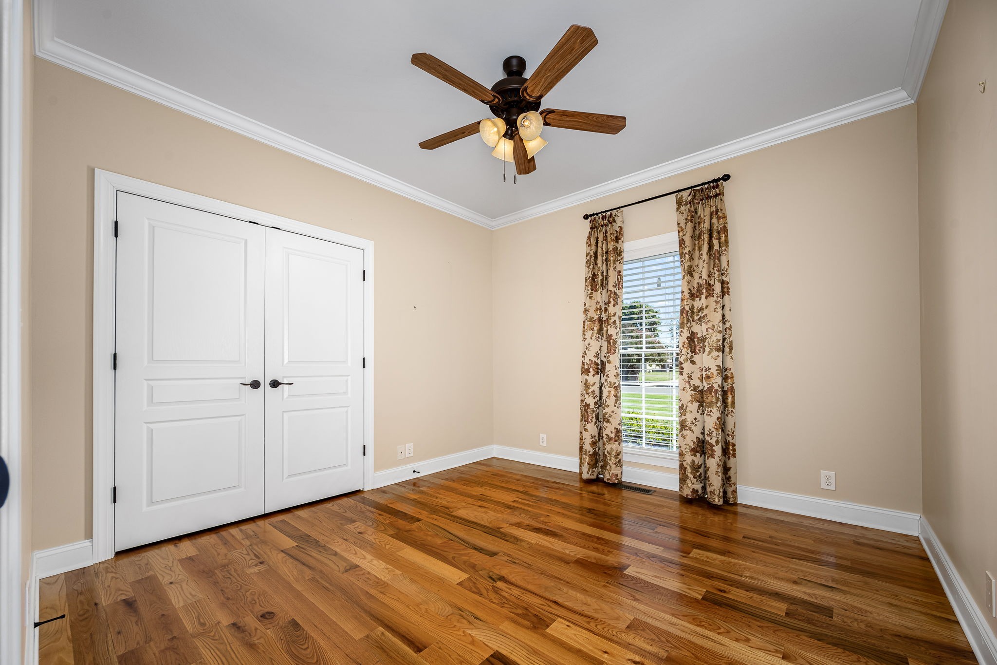 2101 Stratford Road Murfreesboro, TN 37129 - Photo 37 of 54 an empty room with wooden floor and windows