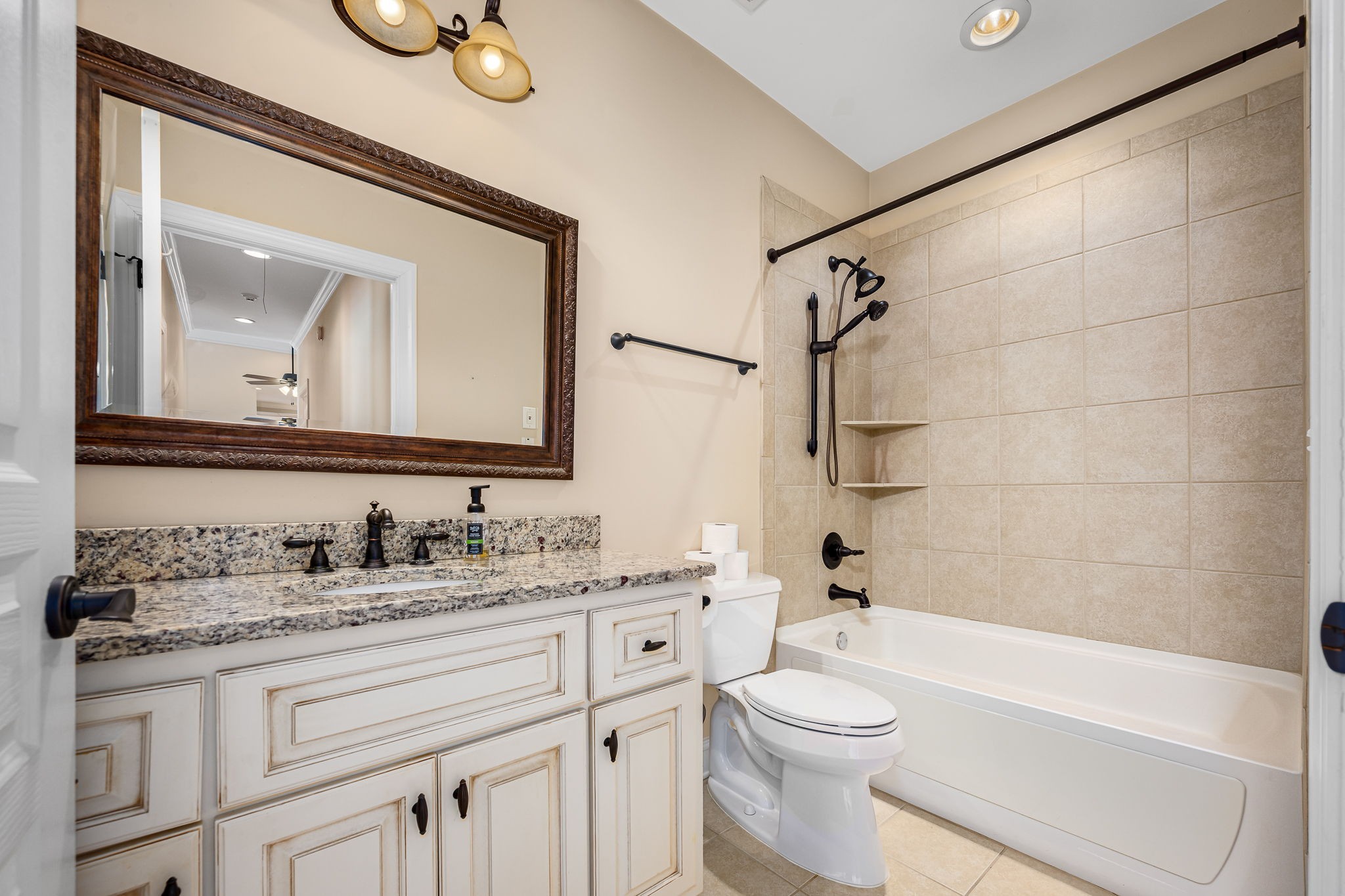 2101 Stratford Road Murfreesboro, TN 37129 - Photo 40 of 54 a bathroom with a toilet a sink and a bathtub