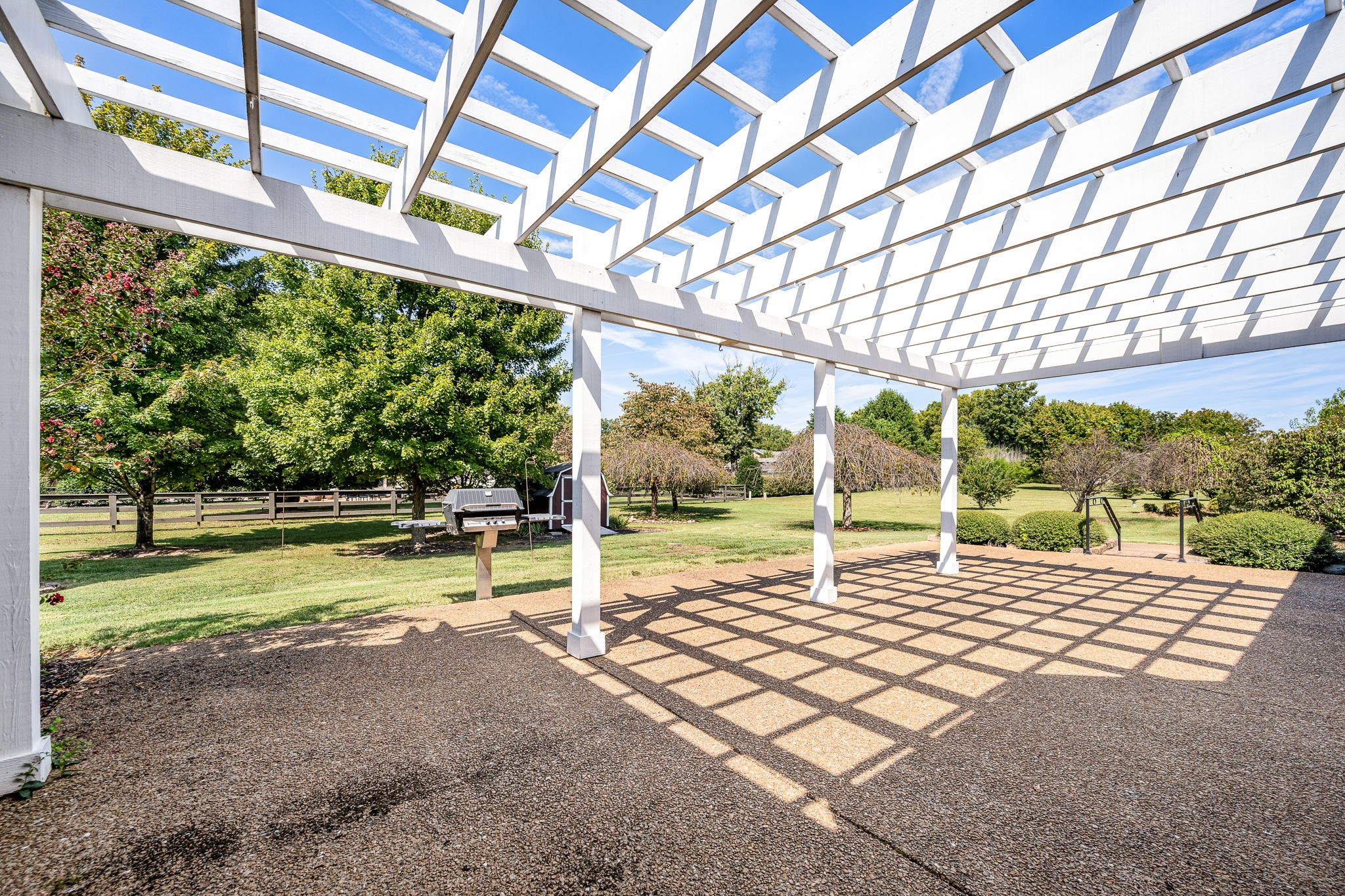 2101 Stratford Road Murfreesboro, TN 37129 - Photo 4 of 54 a backyard of a house with table and chairs