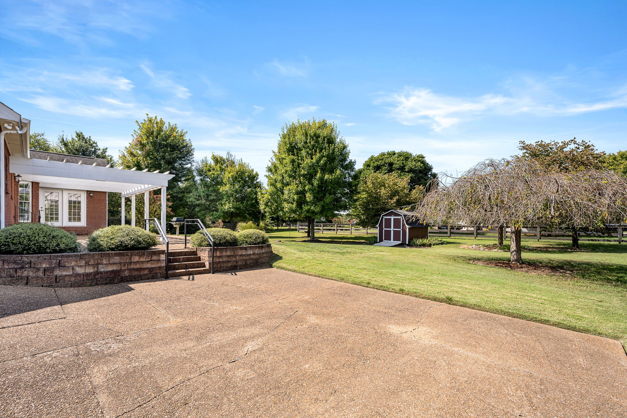 2101 Stratford Road Murfreesboro, TN 37129 - Photo 42 of 54 a view of a house with a big yard and potted plants