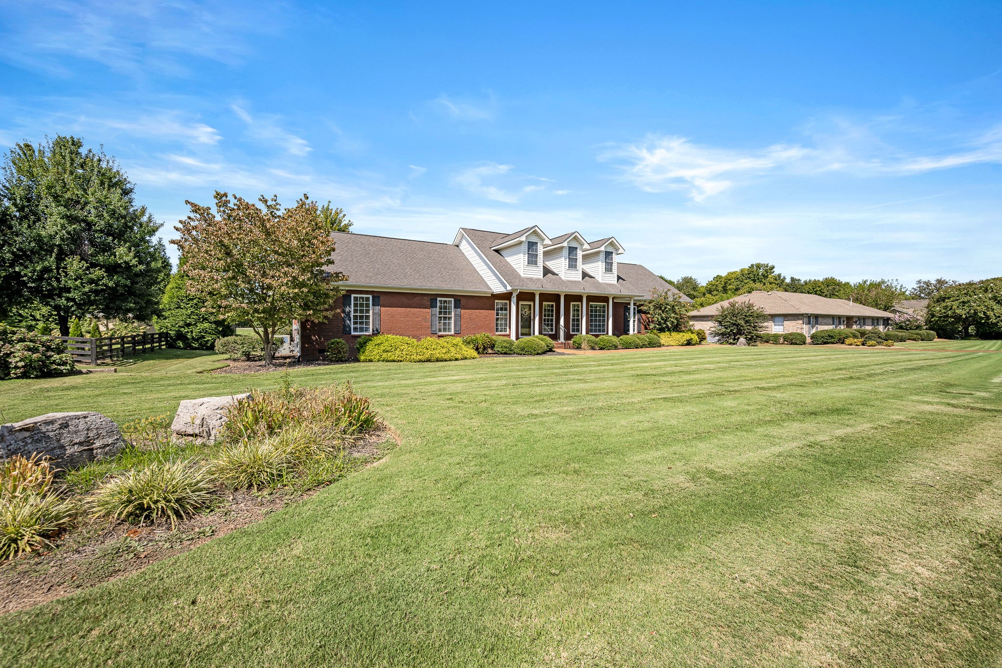 2101 Stratford Road Murfreesboro, TN 37129 - Photo 5 of 54 a front view of a house with garden