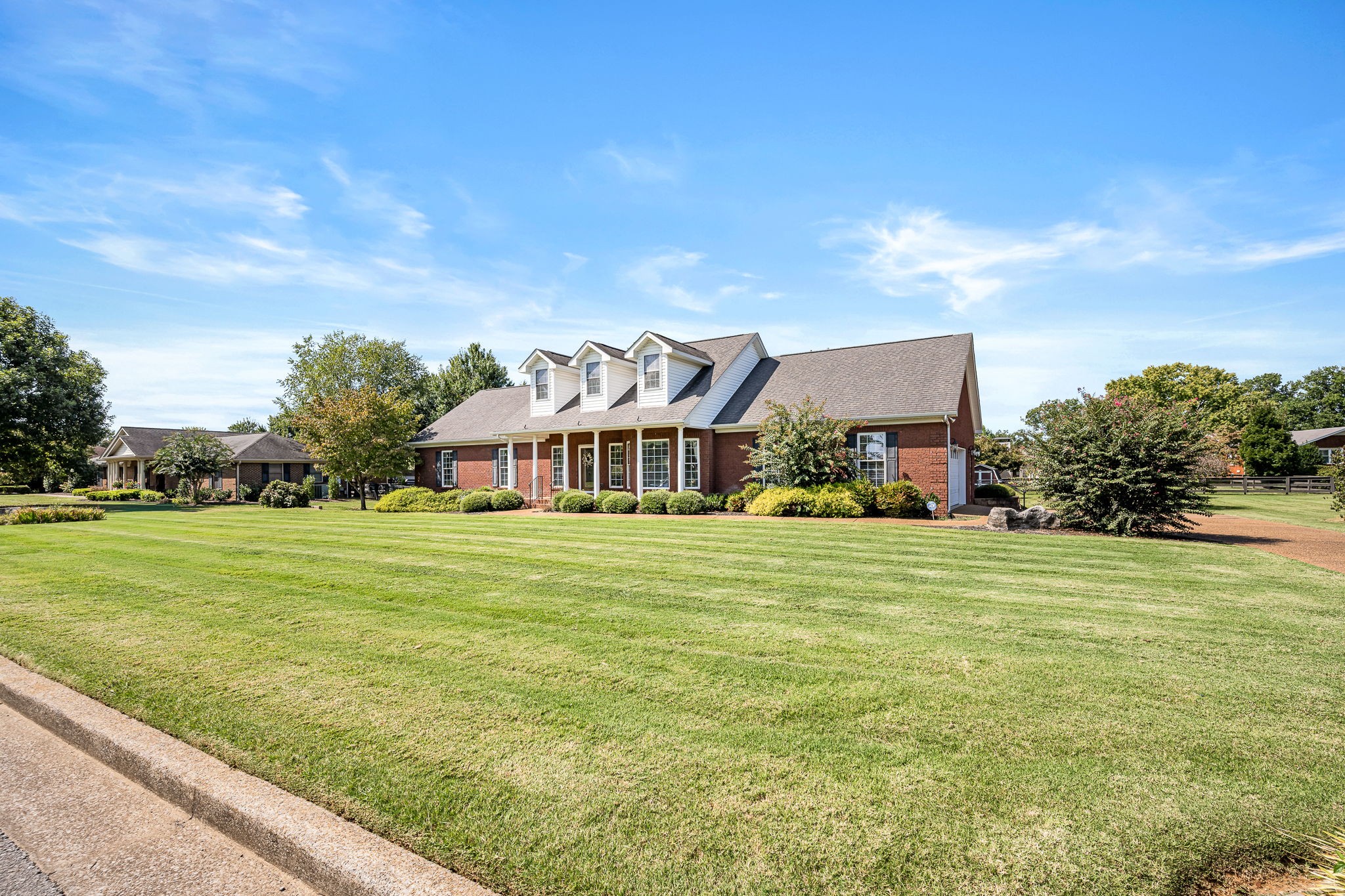 2101 Stratford Road Murfreesboro, TN 37129 - Photo 9 of 54 a front view of a house with a garden