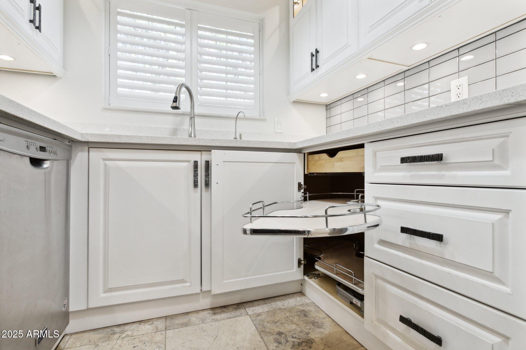 7710 East Gainey Ranch Road, Unit 229 Scottsdale, AZ 85258 - Photo 12 of 50 Pull out cabinets