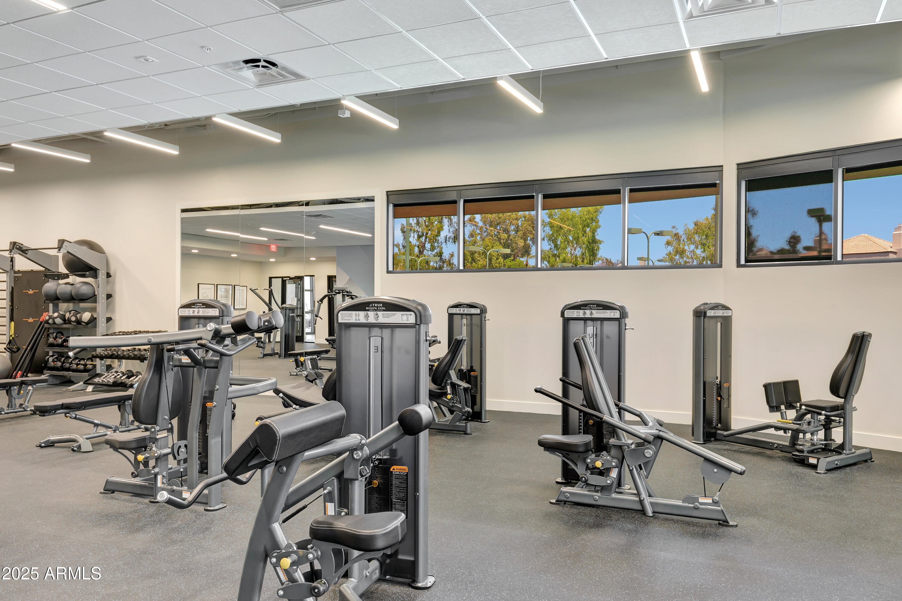 7710 East Gainey Ranch Road, Unit 229 Scottsdale, AZ 85258 - Photo 34 of 50 a view of a room with gym equipment