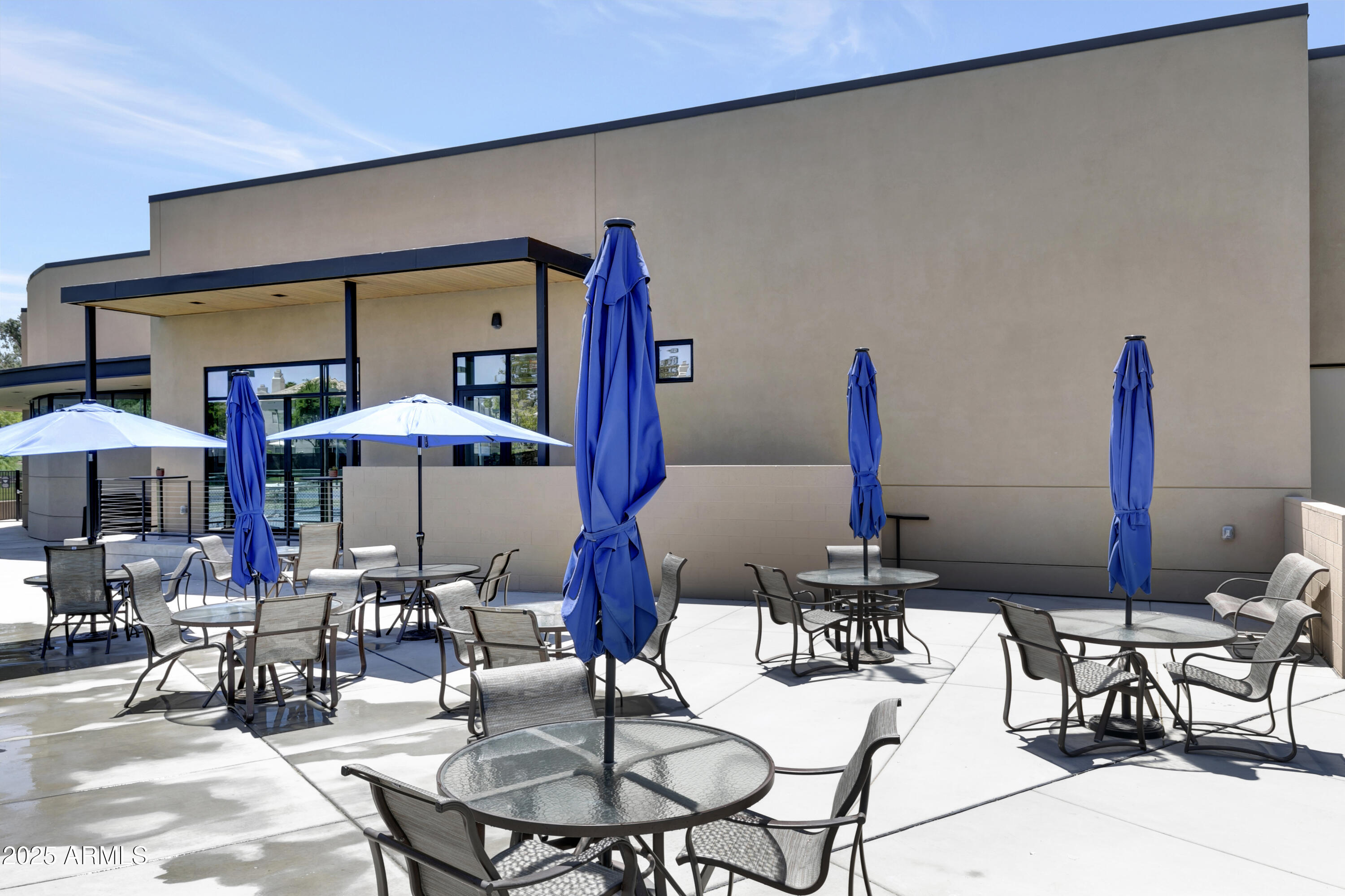 7710 East Gainey Ranch Road, Unit 229 Scottsdale, AZ 85258 - Photo 37 of 50 a view of dinning table and chairs in the patio