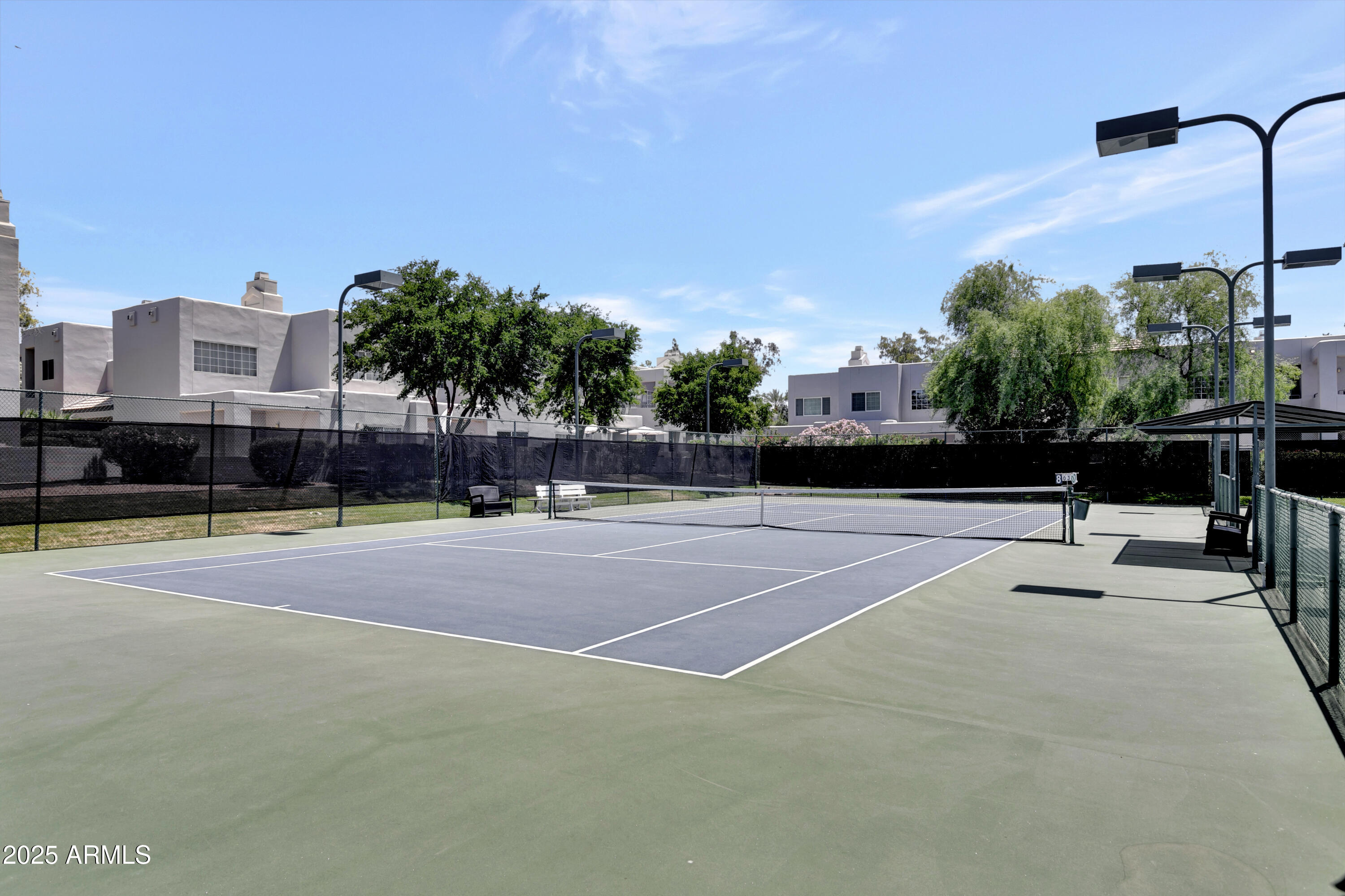 7710 East Gainey Ranch Road, Unit 229 Scottsdale, AZ 85258 - Photo 45 of 50 a view of a tennis court