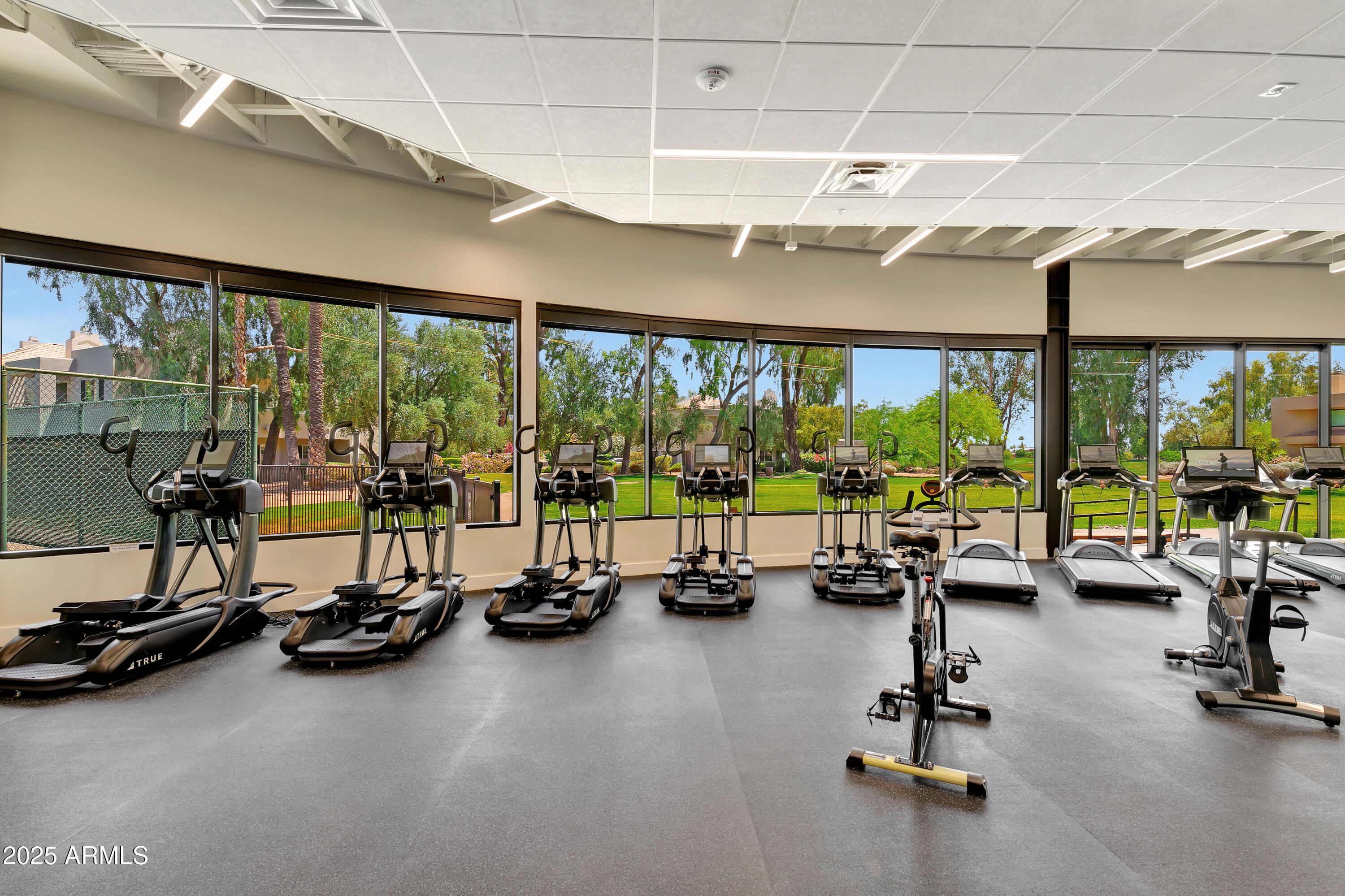7710 East Gainey Ranch Road, Unit 229 Scottsdale, AZ 85258 - Photo 8 of 50 a view of a room with gym equipment