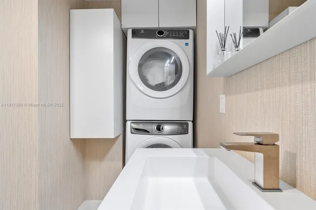 a bedroom with a bed and a wall painting