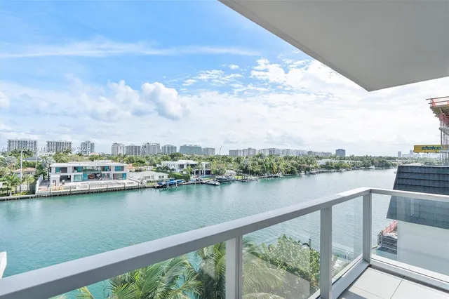 a view of a lake from a balcony