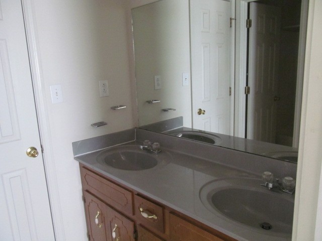 223 Tree Line Drive Oak Grove, KY 42262 - Photo 11 of 14 a bathroom with a sink and a mirror