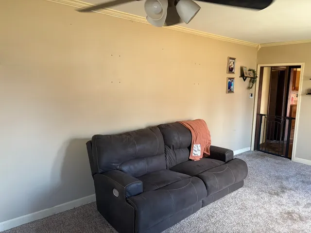 a couch sitting in a living room with a couch