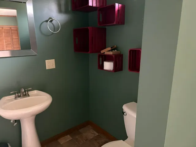 a bathroom with a sink and a toilet
