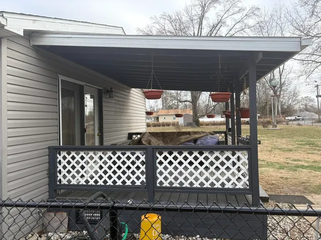 a side view of a wrought iron gate
