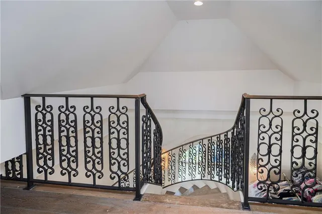 a view of stairs with wooden floor