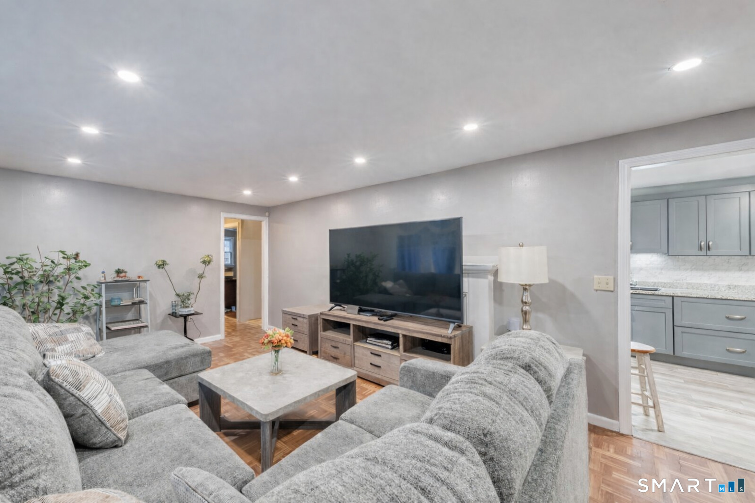 40 Cottage Grove Circle Bloomfield, CT 06002 - Photo 1 of 22 a living room with furniture and a flat screen tv
