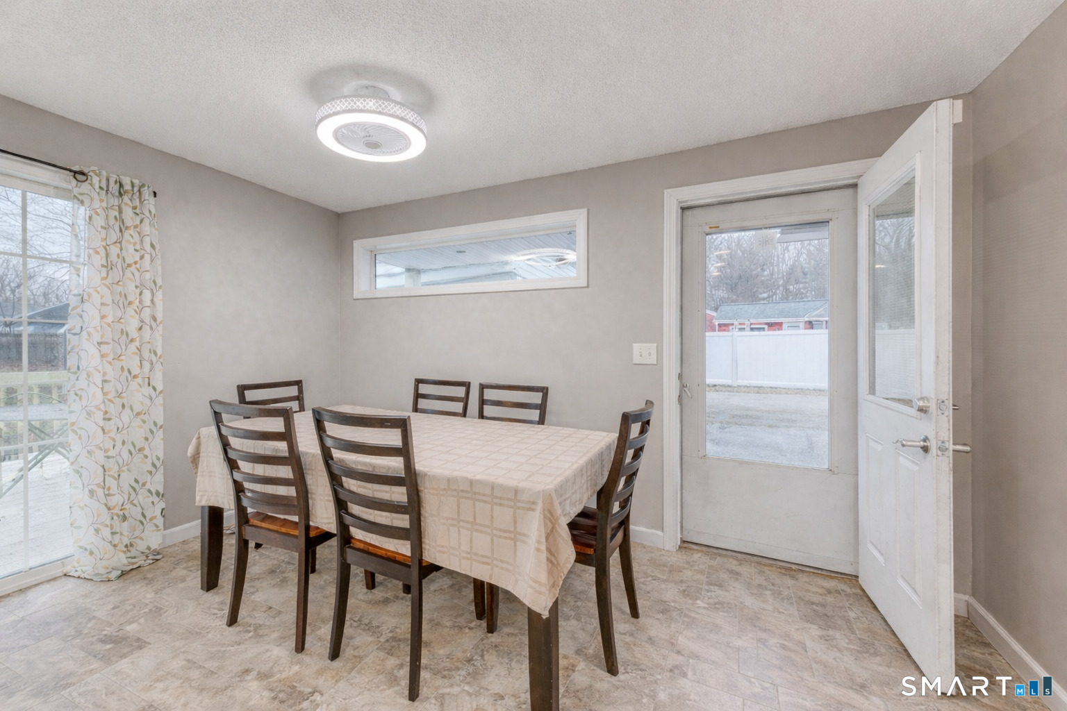 40 Cottage Grove Circle Bloomfield, CT 06002 - Photo 8 of 22 a view of a dining room with furniture