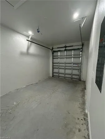 a view of empty room with stairs