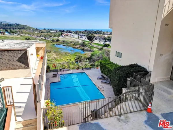 a view of a swimming pool and a terrace
