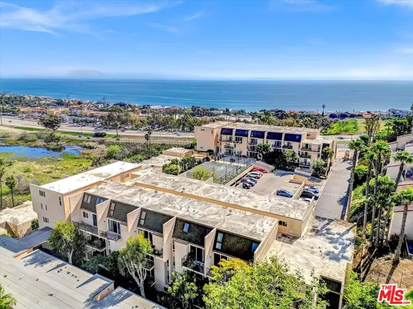 a view of a house with a terrace