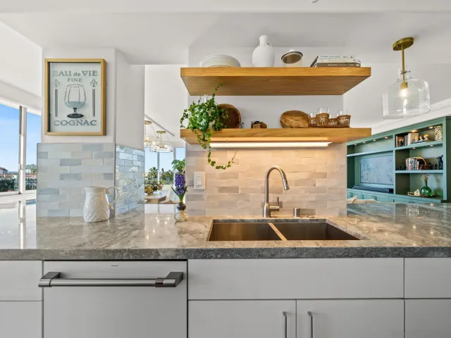 a spacious bedroom with a bed and a table