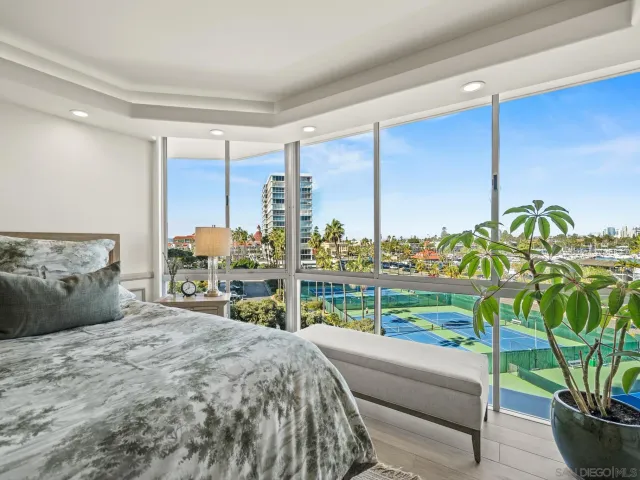a bathroom with double sink and a mirror
