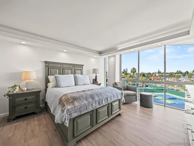 a bathroom with a shower a toilet and sink