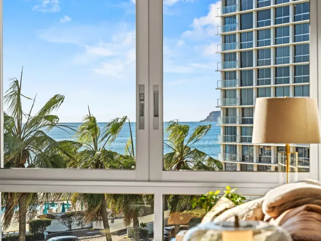 a view of a swimming pool with a lounge chairs